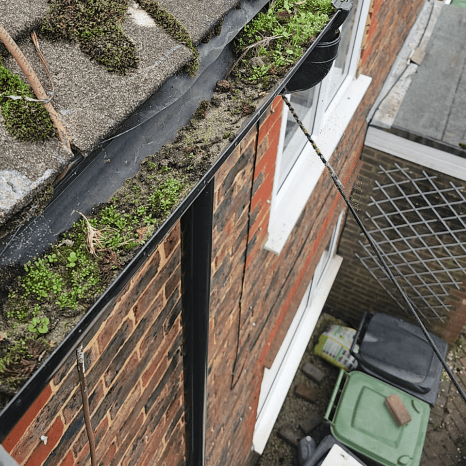 Gutter cleaning job in Redhill, before the gutter cleaning process